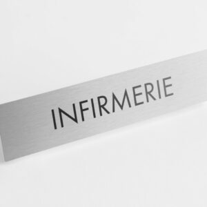 PLAQUETTE OPTIQUE INOX 180x40x1 mm "INFIRMERIE"